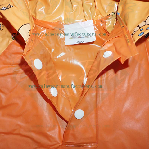 Hooded orange PVC totes rain poncho
